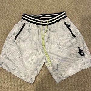 John Geiger mesh shorts. Size large. Worn once or twice.